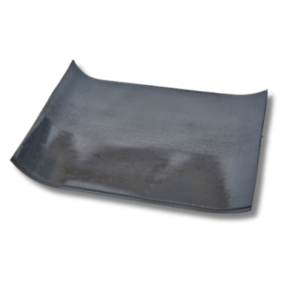 A shiny, black rectangular piece of flashing, slightly curled up at the edges. 