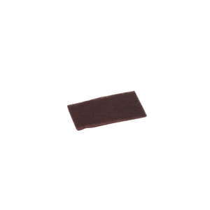 A rectanglular piece of rough-textured brown material that is a scrubber pad.