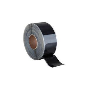 A roll of shiny, black 3" Seam Tape, standing up, with a small piece unfurled.