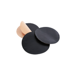 3 matte black circular pieces of flashing, one with its peach-coloured adhesive backing partially pulled back to illustrate its functionality.